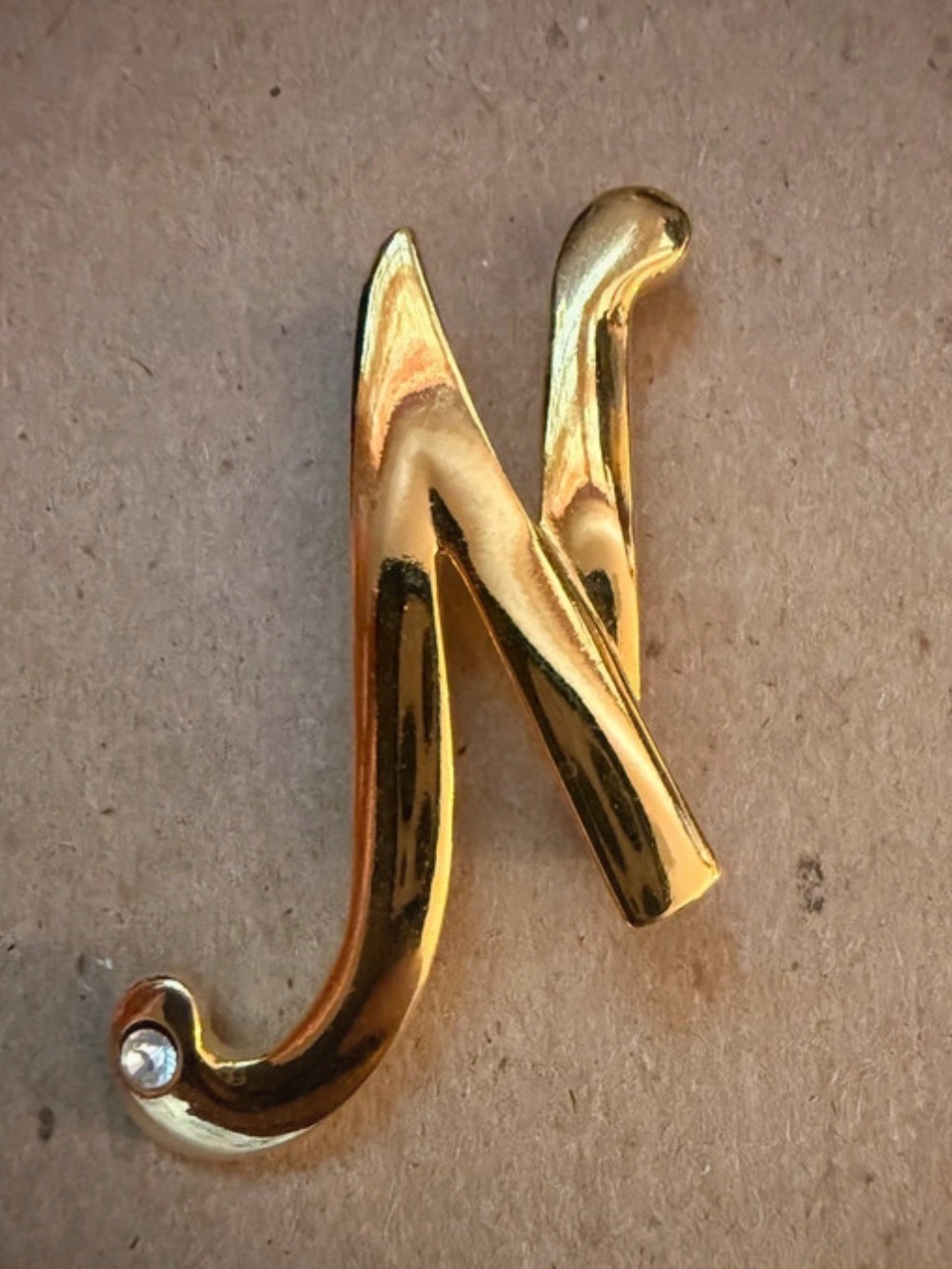 Gold tone Letter N Brooch with Crystal Accent